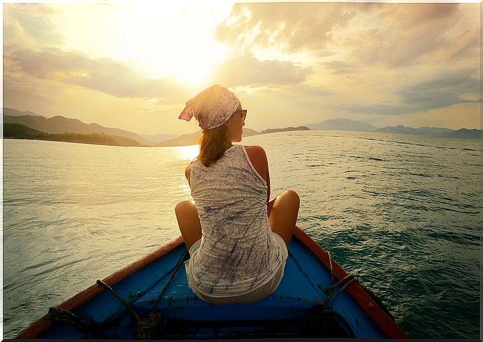 Woman looking at the horizon on a stress trip